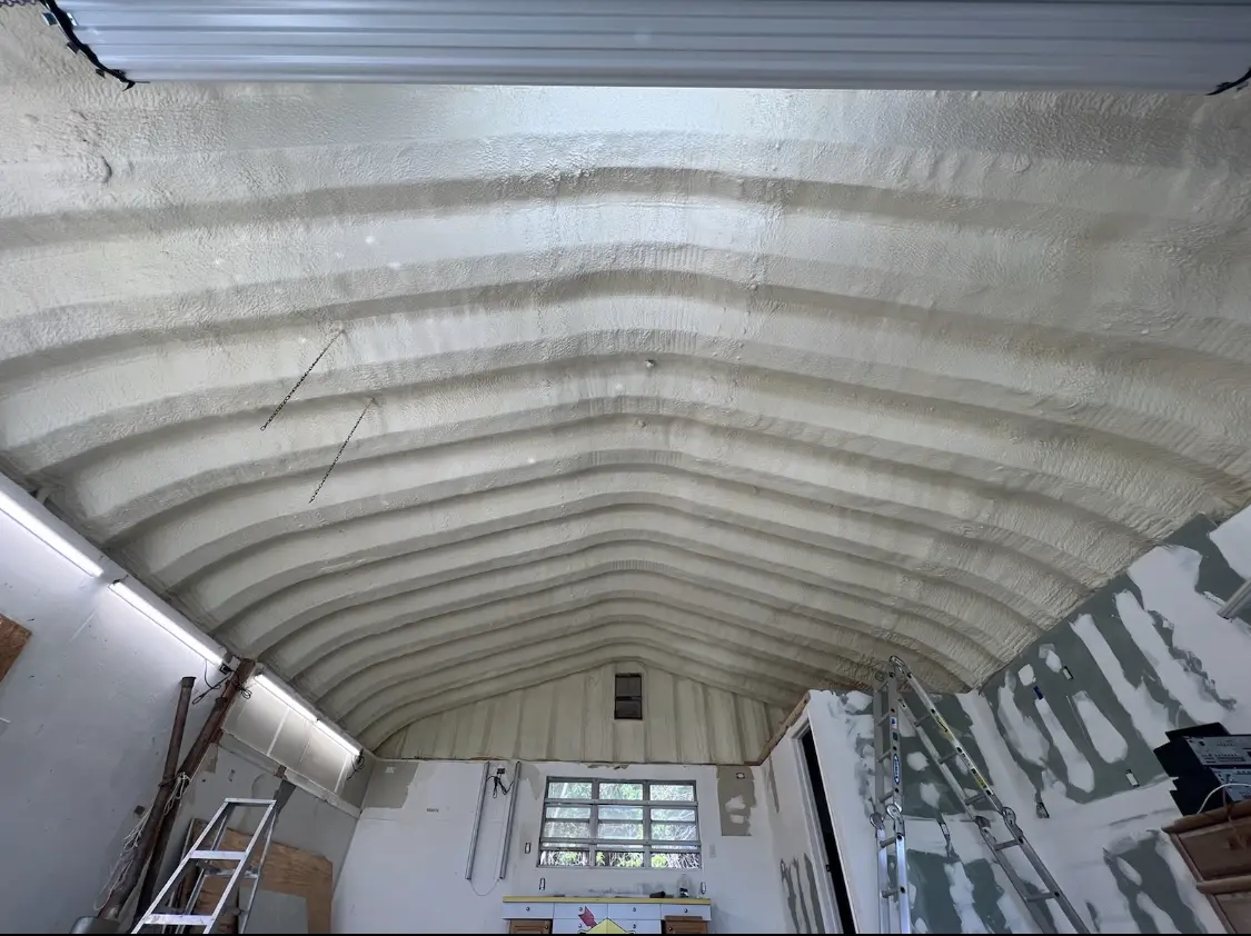 Spray polyurethane foam applied to the underside of a metal roof deck in Mauldin